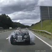 Land vehicle, Vehicle, Car, Aston martin ulster, Race car, Vintage car, Classic car, Sports car, Road, Asphalt,